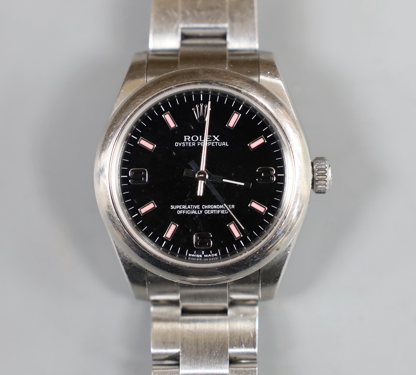 A lady's 2011 stainless steel Rolex Oyster Perpetual wrist watch, on a stainless steel Rolex bracelet, case diameter 31mm, with box and certificate, model no. 177200, serial no. V958067.